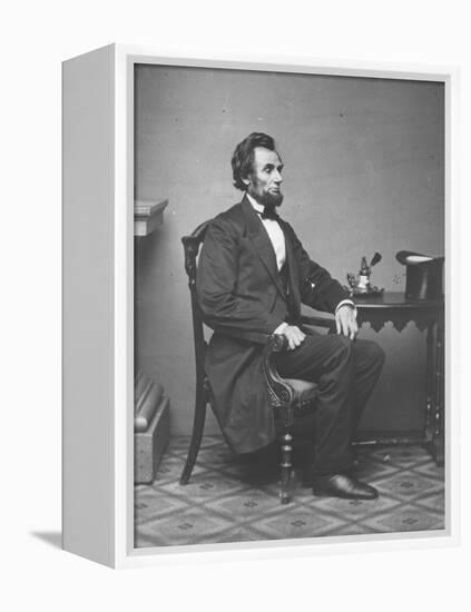 Abraham Lincoln, full-length portrait, seated, 1861-Alexander Gardner-Framed Premier Image Canvas