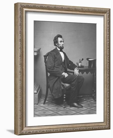 Abraham Lincoln, full-length portrait, seated, 1861-Alexander Gardner-Framed Photographic Print