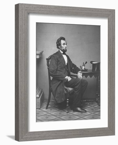 Abraham Lincoln, full-length portrait, seated, 1861-Alexander Gardner-Framed Photographic Print