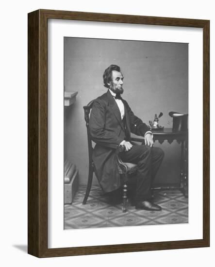 Abraham Lincoln, full-length portrait, seated, 1861-Alexander Gardner-Framed Photographic Print