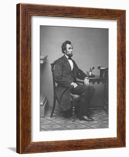 Abraham Lincoln, full-length portrait, seated, 1861-Alexander Gardner-Framed Photographic Print