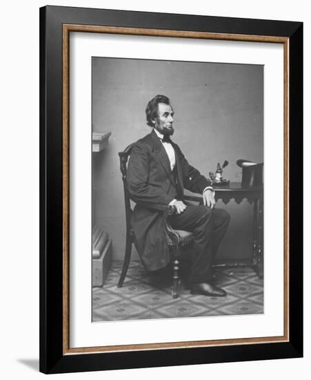 Abraham Lincoln, full-length portrait, seated, 1861-Alexander Gardner-Framed Photographic Print