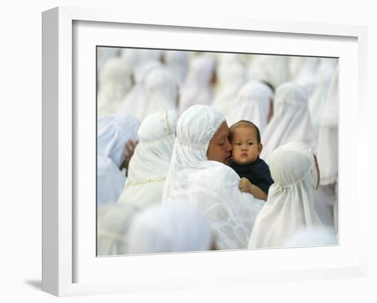 Acehnese Woman Holds a Child after Eid Al-Adha Prayer in the Tsunami-Ravaged Town of Meulaboh-null-Framed Photographic Print