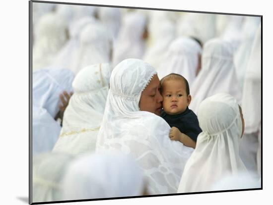 Acehnese Woman Holds a Child after Eid Al-Adha Prayer in the Tsunami-Ravaged Town of Meulaboh-null-Mounted Photographic Print