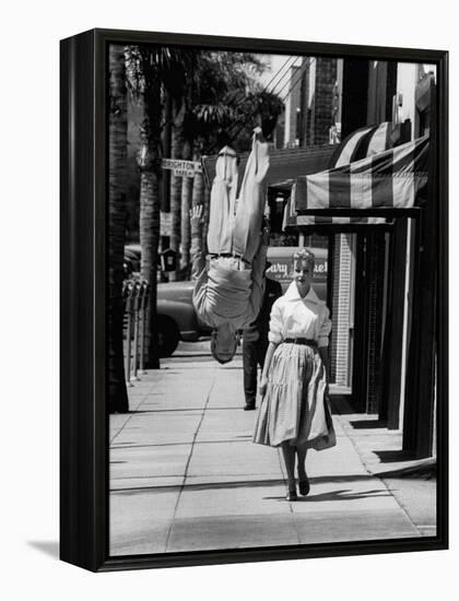 Acrobat and Actor, Russ Tamblyn Doing a Flip on the Sidewalk with Starlet Venetia Stevenson-Allan Grant-Framed Premier Image Canvas