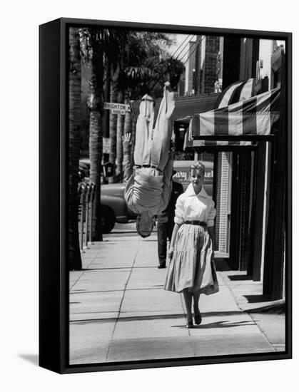 Acrobat and Actor, Russ Tamblyn Doing a Flip on the Sidewalk with Starlet Venetia Stevenson-Allan Grant-Framed Premier Image Canvas