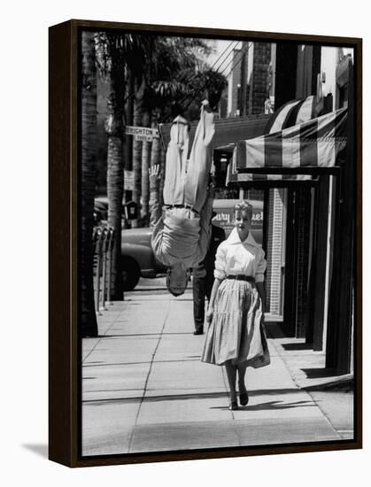 Acrobat and Actor, Russ Tamblyn Doing a Flip on the Sidewalk with Starlet Venetia Stevenson-Allan Grant-Framed Premier Image Canvas