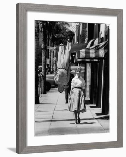 Acrobat and Actor, Russ Tamblyn Doing a Flip on the Sidewalk with Starlet Venetia Stevenson-Allan Grant-Framed Premium Photographic Print