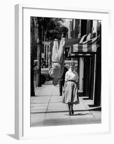 Acrobat and Actor, Russ Tamblyn Doing a Flip on the Sidewalk with Starlet Venetia Stevenson-Allan Grant-Framed Premium Photographic Print