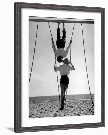 Acrobat and Actor, Russ Tamblyn on the Beach with Movie Actress Venetia Stevenson-Allan Grant-Framed Premium Photographic Print