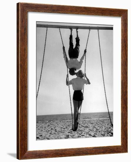 Acrobat and Actor, Russ Tamblyn on the Beach with Movie Actress Venetia Stevenson-Allan Grant-Framed Premium Photographic Print