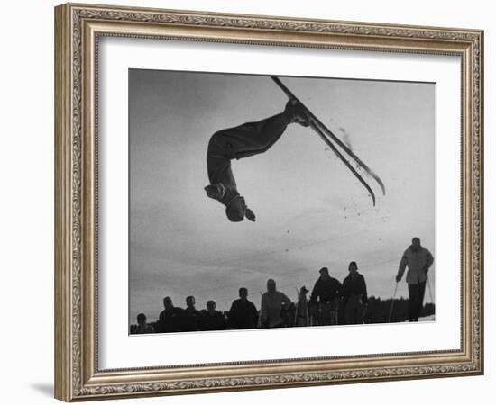 Acrobatic Skier Jack Reddish in Somersault at Sun Valley Ski Resort-J^ R^ Eyerman-Framed Photographic Print