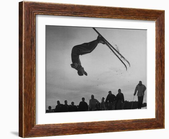 Acrobatic Skier Jack Reddish in Somersault at Sun Valley Ski Resort-J^ R^ Eyerman-Framed Photographic Print