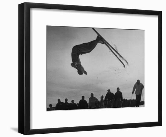 Acrobatic Skier Jack Reddish in Somersault at Sun Valley Ski Resort-J^ R^ Eyerman-Framed Photographic Print