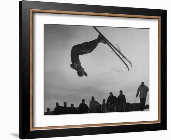 Acrobatic Skier Jack Reddish in Somersault at Sun Valley Ski Resort-J^ R^ Eyerman-Framed Photographic Print