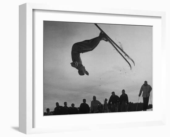 Acrobatic Skier Jack Reddish in Somersault at Sun Valley Ski Resort-J^ R^ Eyerman-Framed Photographic Print