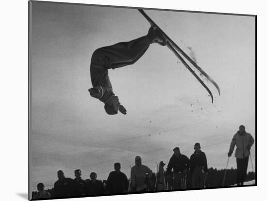 Acrobatic Skier Jack Reddish in Somersault at Sun Valley Ski Resort-J^ R^ Eyerman-Mounted Photographic Print