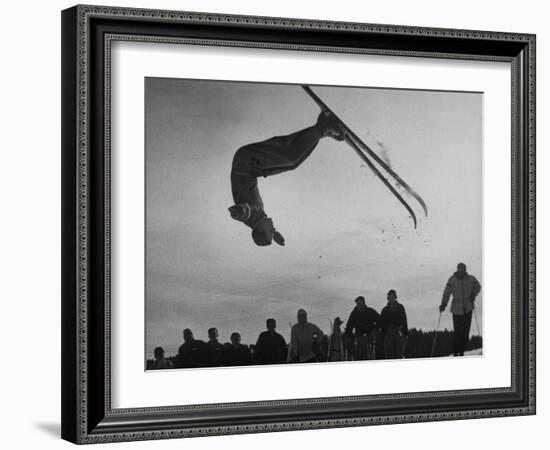 Acrobatic Skier Jack Reddish in Somersault at Sun Valley Ski Resort-J^ R^ Eyerman-Framed Photographic Print