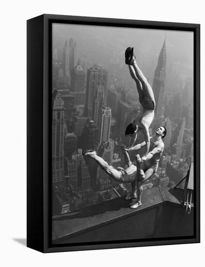 Acrobats Performing on the Empire State Building-null-Framed Premier Image Canvas