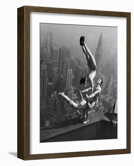 Acrobats Performing on the Empire State Building-null-Framed Photographic Print