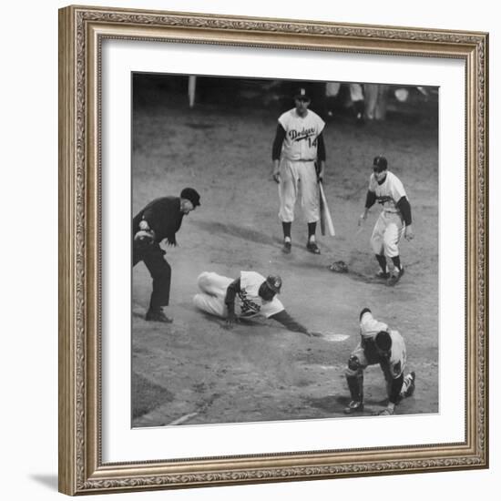 Action During a Game Between the Brooklyn Dodgers and the Milwaukee Braves at Ebbet's Field-Ralph Morse-Framed Premium Photographic Print