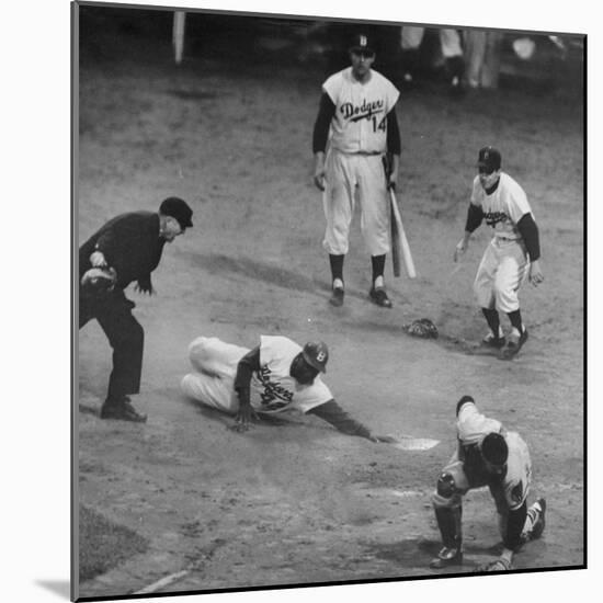 Action During a Game Between the Brooklyn Dodgers and the Milwaukee Braves at Ebbet's Field-Ralph Morse-Mounted Premium Photographic Print
