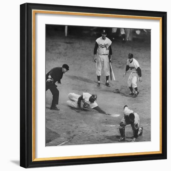 Action During a Game Between the Brooklyn Dodgers and the Milwaukee Braves at Ebbet's Field-Ralph Morse-Framed Premium Photographic Print