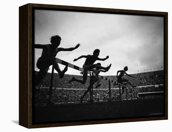 Action During the Women's 100m Hurdles at the 1952 Olympic Games in Helsinki-Mark Kauffman-Framed Premier Image Canvas