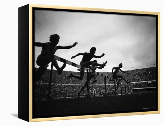 Action During the Women's 100m Hurdles at the 1952 Olympic Games in Helsinki-Mark Kauffman-Framed Premier Image Canvas