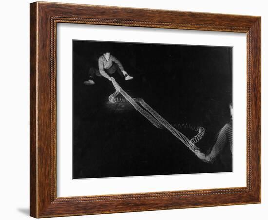 Action of Wave Mechanics of Light and Radio Illustrated by Use of Slinky Toy, MIT-Fritz Goro-Framed Photographic Print