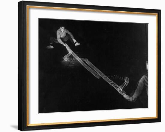 Action of Wave Mechanics of Light and Radio Illustrated by Use of Slinky Toy, MIT-Fritz Goro-Framed Photographic Print