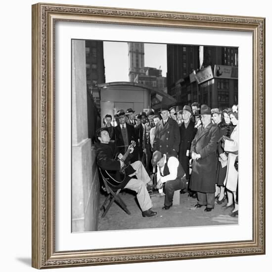 Activist Folk Musician Woody Guthrie Playing for a Crowd of New Yorkers-null-Framed Premium Photographic Print