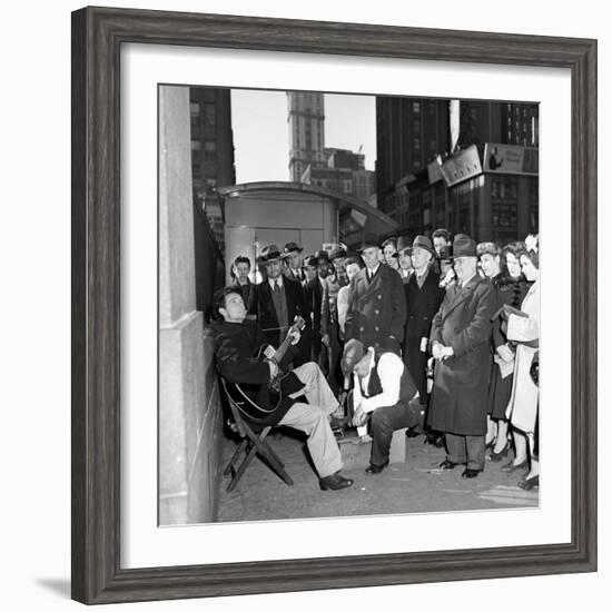 Activist Folk Musician Woody Guthrie Playing for a Crowd of New Yorkers-null-Framed Premium Photographic Print