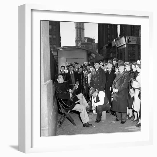 Activist Folk Musician Woody Guthrie Playing for a Crowd of New Yorkers-null-Framed Premium Photographic Print