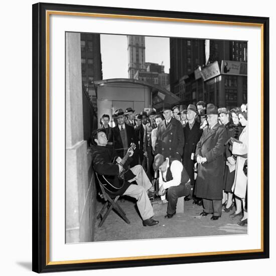 Activist Folk Musician Woody Guthrie Playing for a Crowd of New Yorkers-null-Framed Premium Photographic Print