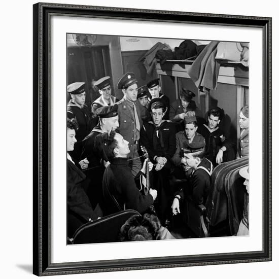 Activist Folk Musician Woody Guthrie Playing for a Group of Servicemen During WWII-Eric Schaal-Framed Premium Photographic Print