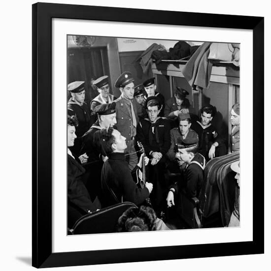 Activist Folk Musician Woody Guthrie Playing for a Group of Servicemen During WWII-Eric Schaal-Framed Premium Photographic Print