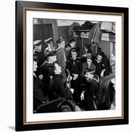 Activist Folk Musician Woody Guthrie Playing for a Group of Servicemen During WWII-Eric Schaal-Framed Premium Photographic Print