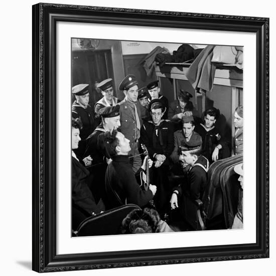 Activist Folk Musician Woody Guthrie Playing for a Group of Servicemen During WWII-Eric Schaal-Framed Premium Photographic Print