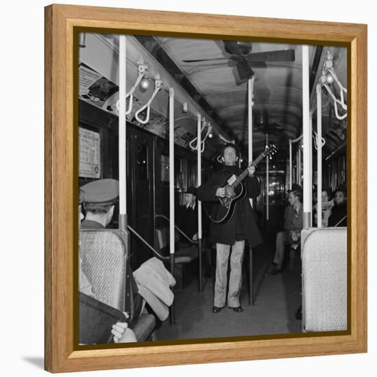 Activist Folk Musician Woody Guthrie Playing for a Subway Car of New Yorkers-Eric Schaal-Framed Premier Image Canvas