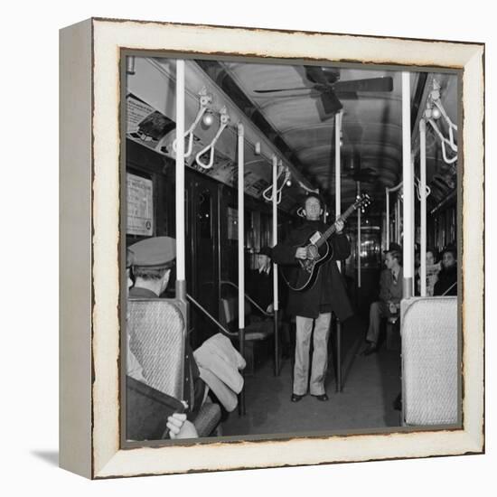 Activist Folk Musician Woody Guthrie Playing for a Subway Car of New Yorkers-Eric Schaal-Framed Premier Image Canvas