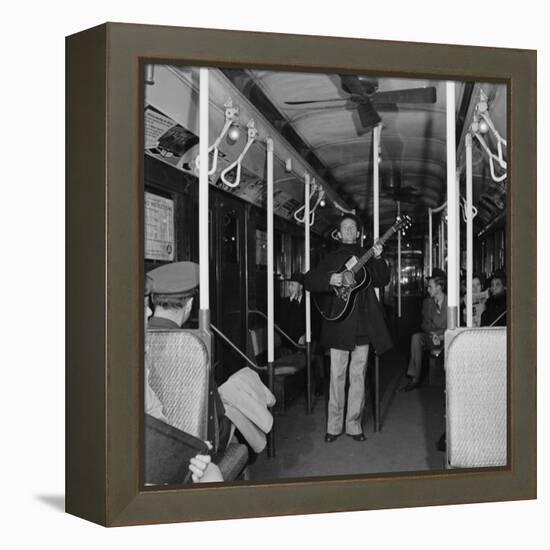 Activist Folk Musician Woody Guthrie Playing for a Subway Car of New Yorkers-Eric Schaal-Framed Premier Image Canvas