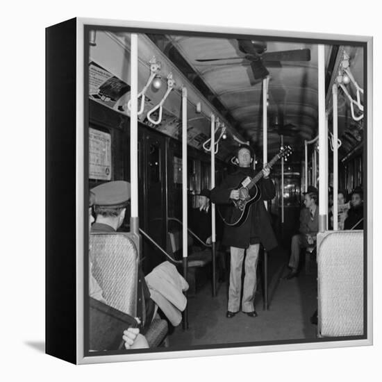 Activist Folk Musician Woody Guthrie Playing for a Subway Car of New Yorkers-Eric Schaal-Framed Premier Image Canvas
