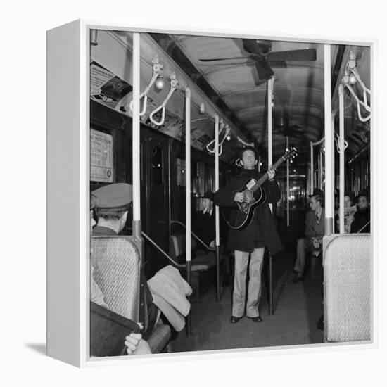 Activist Folk Musician Woody Guthrie Playing for a Subway Car of New Yorkers-Eric Schaal-Framed Premier Image Canvas