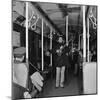 Activist Folk Musician Woody Guthrie Playing for a Subway Car of New Yorkers-Eric Schaal-Mounted Premium Photographic Print