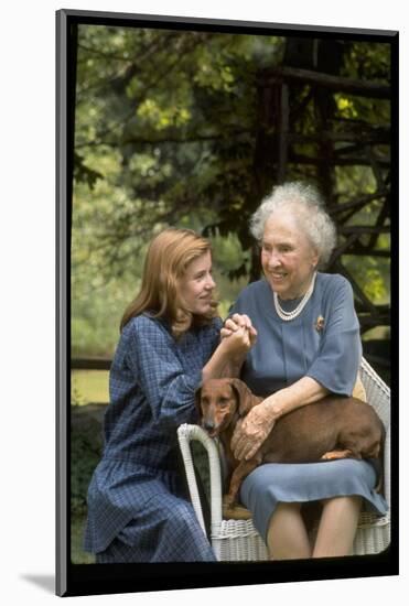 Activist for the Disabled, Helen Keller, with Pet Dog in Her Lap as She Meets Actress Patty Duke-Nina Leen-Mounted Photographic Print