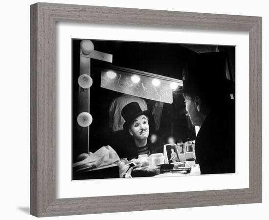 Actor Charlie Chaplin Looking Putting on Makeup for Role as Animal Trainer in Film "Limelight"-W^ Eugene Smith-Framed Premium Photographic Print