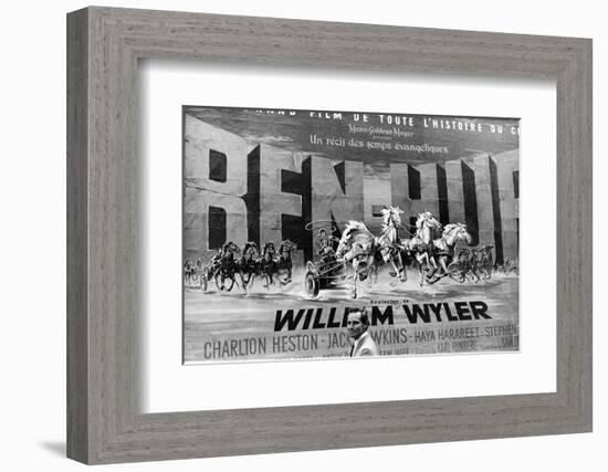 Actor Charlton Heston Posing in Front of Billboard of Film, Ben Hur-null-Framed Photographic Print