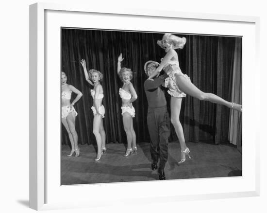 Actor Clowning around with Dancing Girls During the Nightlife in Las Vegas-Loomis Dean-Framed Premium Photographic Print