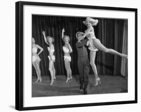 Actor Clowning around with Dancing Girls During the Nightlife in Las Vegas-Loomis Dean-Framed Premium Photographic Print